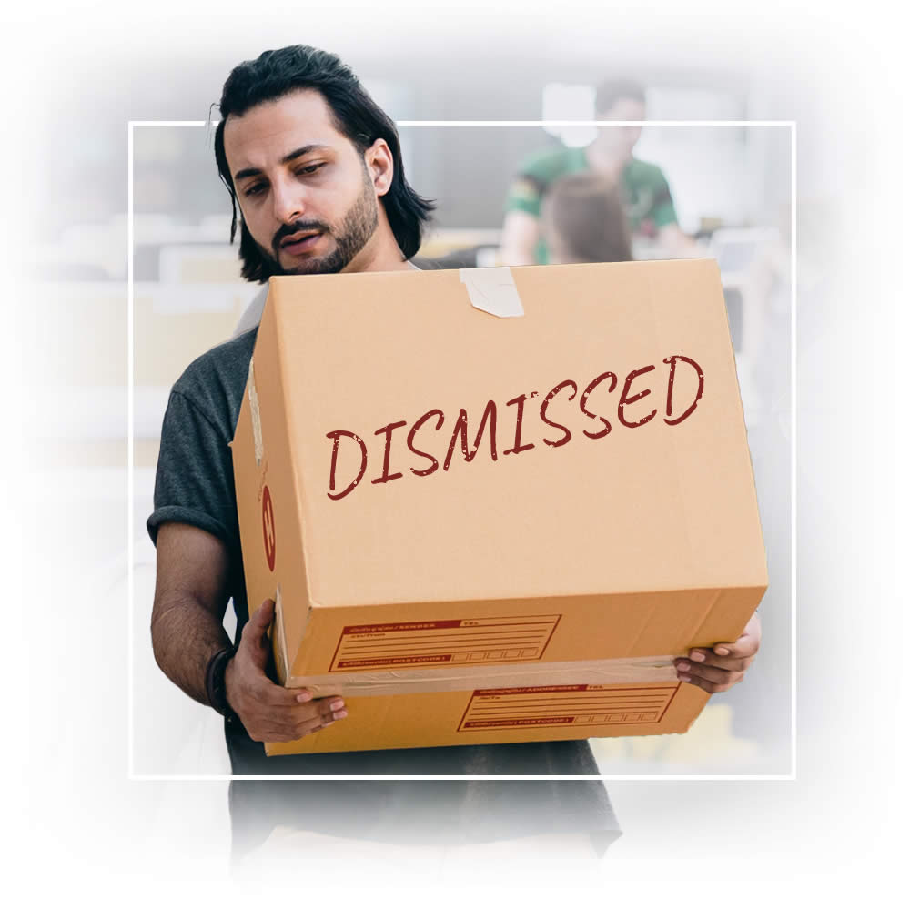 Photo of a person being unfairly dismissed from their job - Andrew Egan Associates solicitors can help!